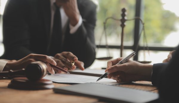 Good service cooperation, Consultation of Businesswoman and Male Good service cooperation, Consultation of Businesswoman and Male lawyer or judge counselor having team meeting with client, Law and Legal services concept.